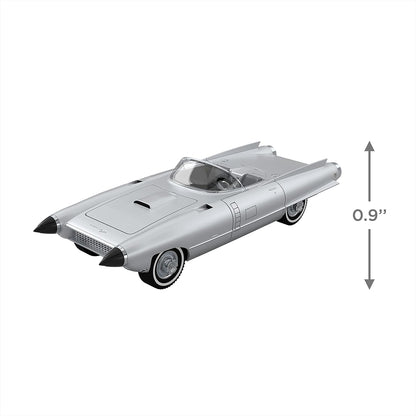 Model of a futuristic car with dimensions indicated on a white background