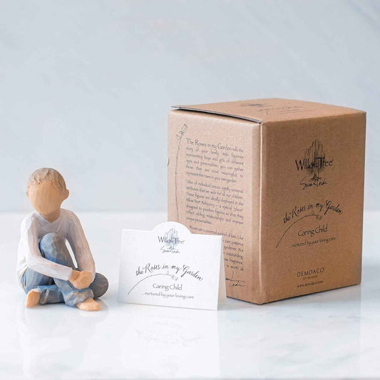 Willow Tree Caring Child, Nurtured by Your Loving Care, Seated Boy Figure in Blue Jeans, Works Well in Groupings That Reflect Family Relationships, Sculpted Hand-Painted Figure